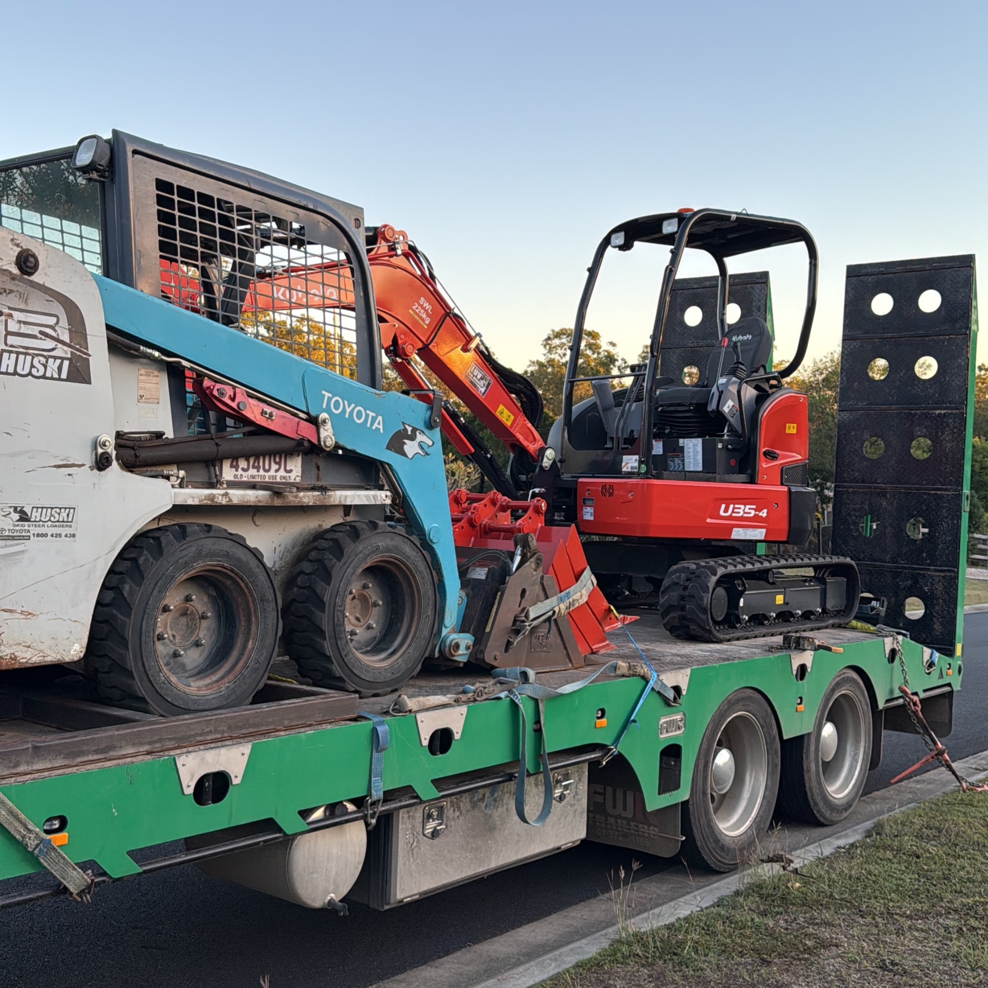Komatsu excavator working on a residential block