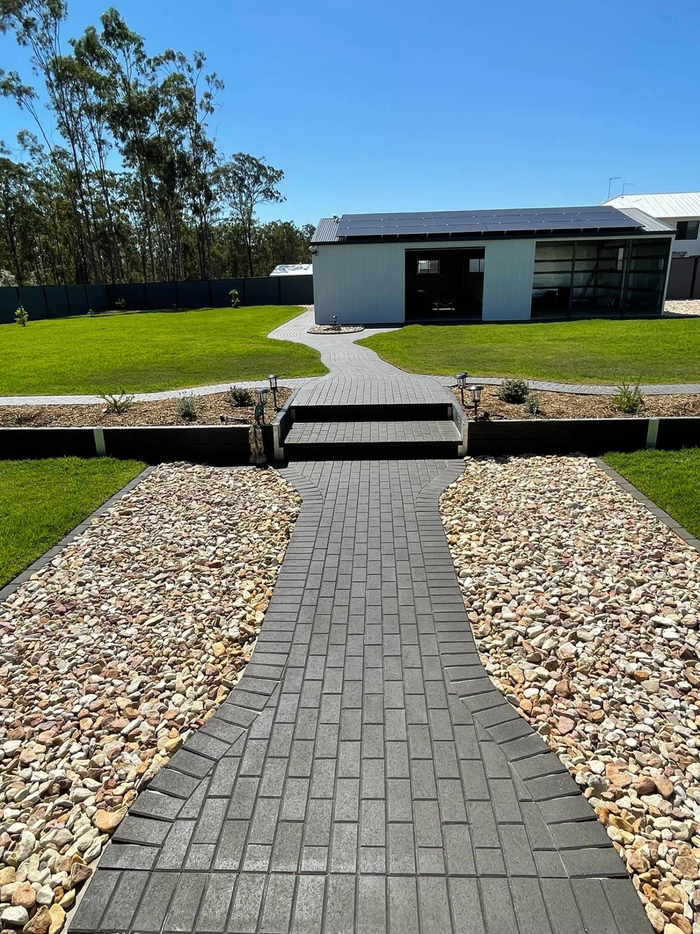 Stepped paver entry from the shed back to the house.
